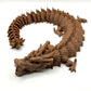 3D printed articulating dragon in vibrant colors
