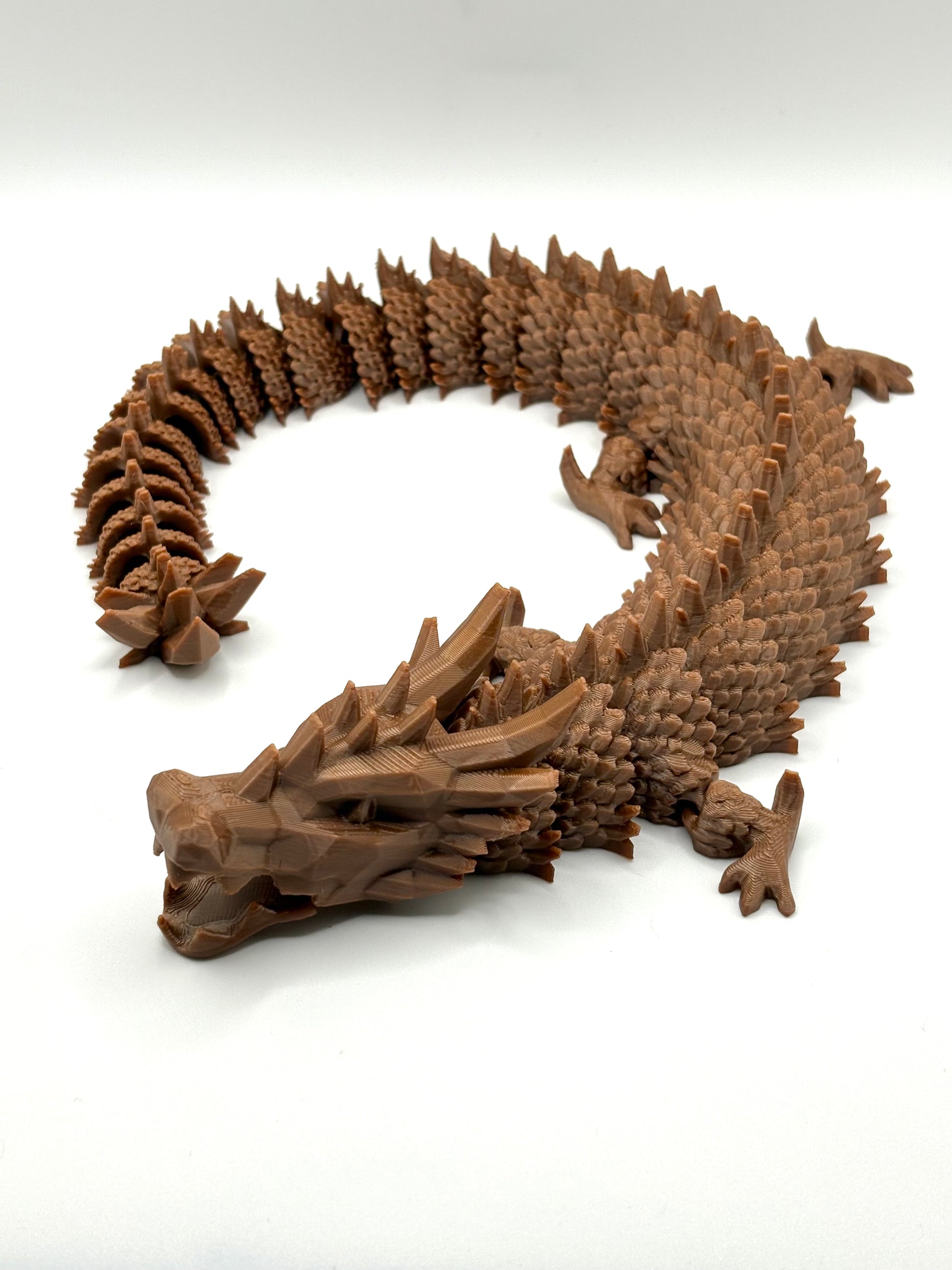 3D printed articulating dragon in vibrant colors
