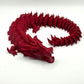 3D printed articulating dragon in vibrant colors
