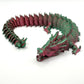 3D printed articulating dragon in vibrant colors

