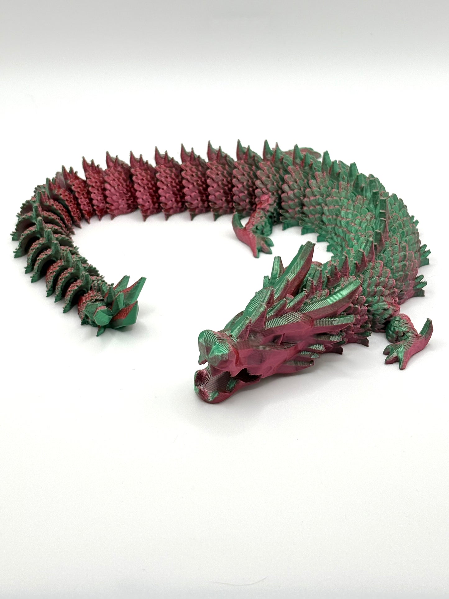 3D printed articulating dragon in vibrant colors
