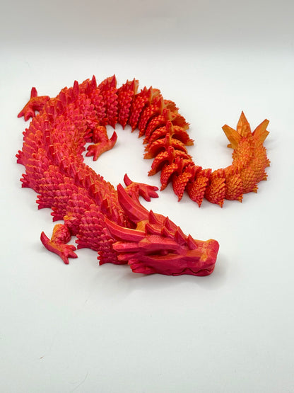 3D printed articulating dragon in vibrant colors

