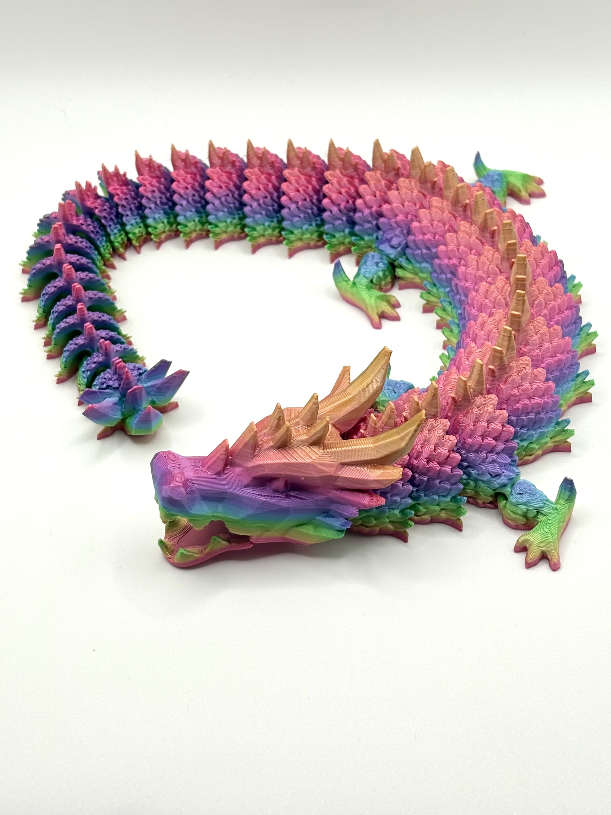 3D printed articulating dragon in vibrant colors
