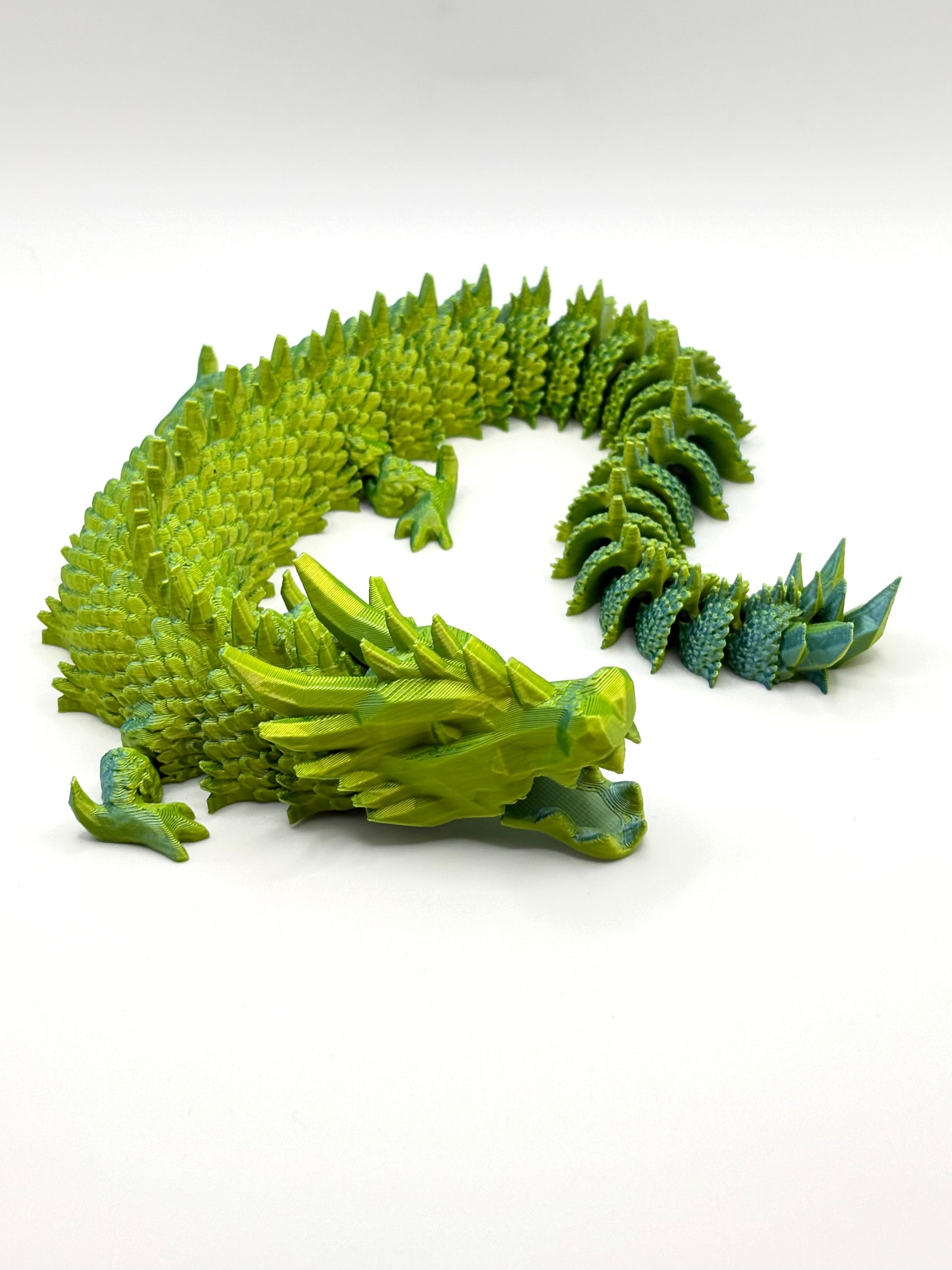 3D printed articulating dragon in vibrant colors
