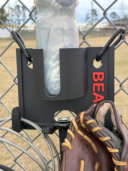 3D printed dugout organizer holding baseball gear on fence