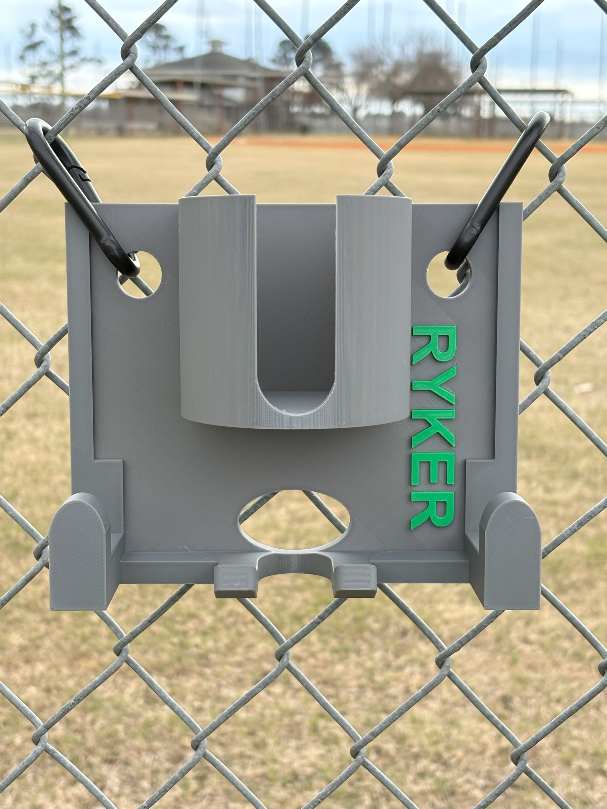 Compact dugout gear holder attached to chain-link fence