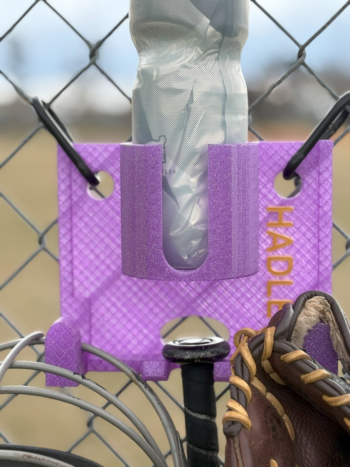 Colorful dugout organizer with hooks for helmets and gloves